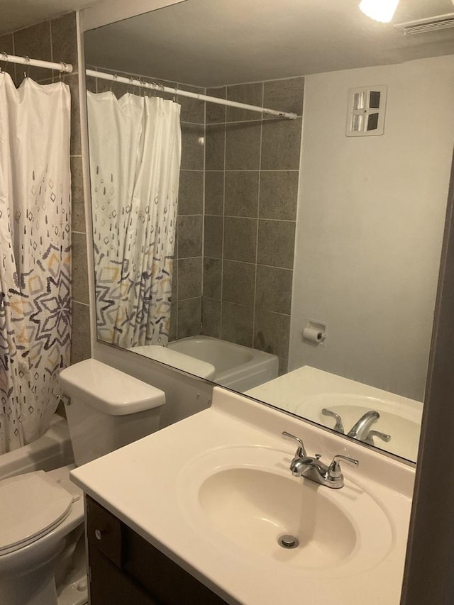 3010 Bernice Rd Unit 104, Lansing, IL 60438 - full bathroom with vanity, shower / bath combo, and toilet
