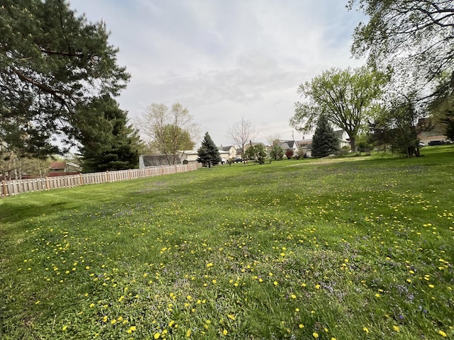 view of yard featuring fence