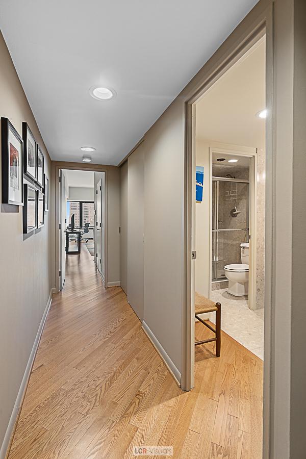 175 E Delaware Pl Unit 5019, Chicago, IL 60611 - hall with light wood-style floors and baseboards