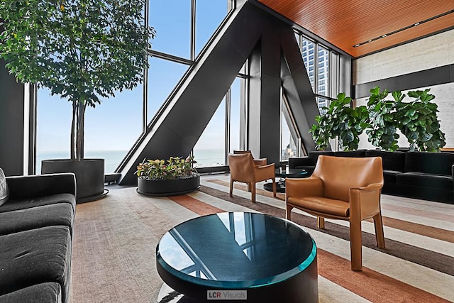 175 E Delaware Pl Unit 5019, Chicago, IL 60611 - lobby featuring expansive windows, a towering ceiling, a water view, and stairs