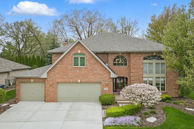 12652 Suffield Dr, Palos Park, IL 60464 - traditional-style home with concrete driveway, brick siding, a shingled roof, and a chimney
