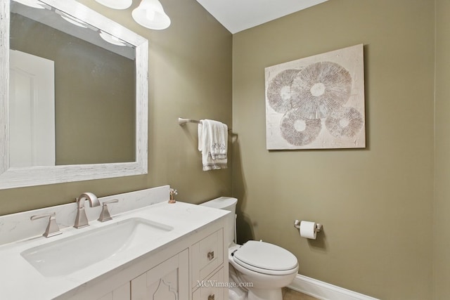 12652 Suffield Dr, Palos Park, IL 60464 - half bathroom featuring toilet, baseboards, and vanity