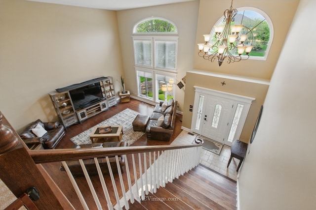 12652 Suffield Dr, Palos Park, IL 60464 - foyer entrance featuring wood finished floors, a chandelier, and a towering ceiling