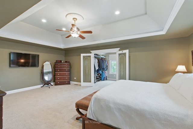 12652 Suffield Dr, Palos Park, IL 60464 - bedroom featuring light colored carpet, a ceiling fan, baseboards, a tray ceiling, and a closet