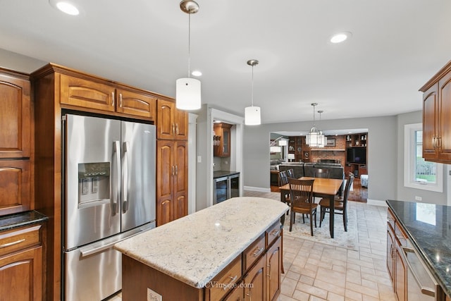 12652 Suffield Dr, Palos Park, IL 60464 - kitchen featuring recessed lighting, dark stone countertops, brown cabinets, and stainless steel fridge with ice dispenser