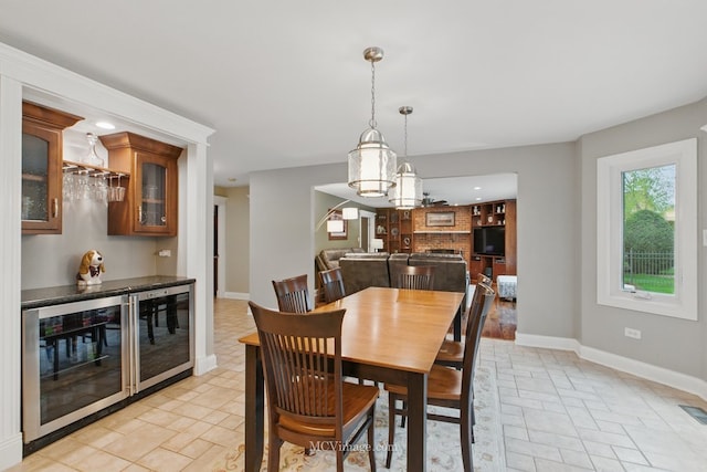 12652 Suffield Dr, Palos Park, IL 60464 - dining room with recessed lighting, baseboards, a bar, and wine cooler