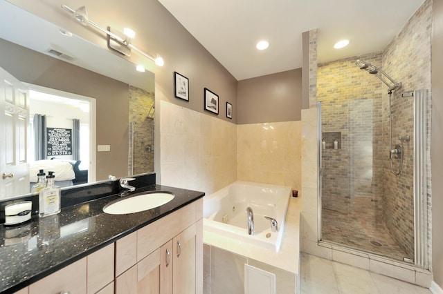 1521 N Ashland Ave Unit 2, Chicago, IL 60622 - full bath featuring a stall shower, ensuite bath, a jetted tub, vanity, and tile patterned floors