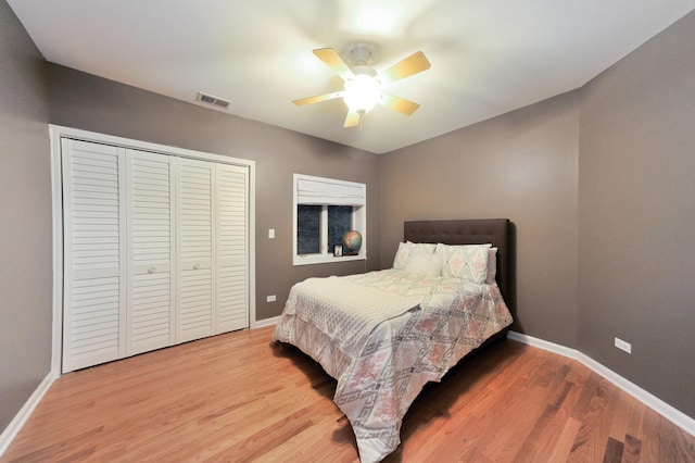 1521 N Ashland Ave Unit 2, Chicago, IL 60622 - bedroom featuring light wood-style floors, baseboards, a closet, and ceiling fan