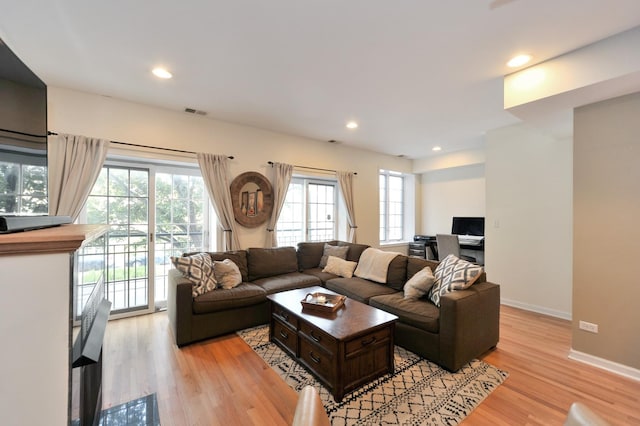 1521 N Ashland Ave Unit 2, Chicago, IL 60622 - living room featuring plenty of natural light, light wood-type flooring, recessed lighting, and baseboards