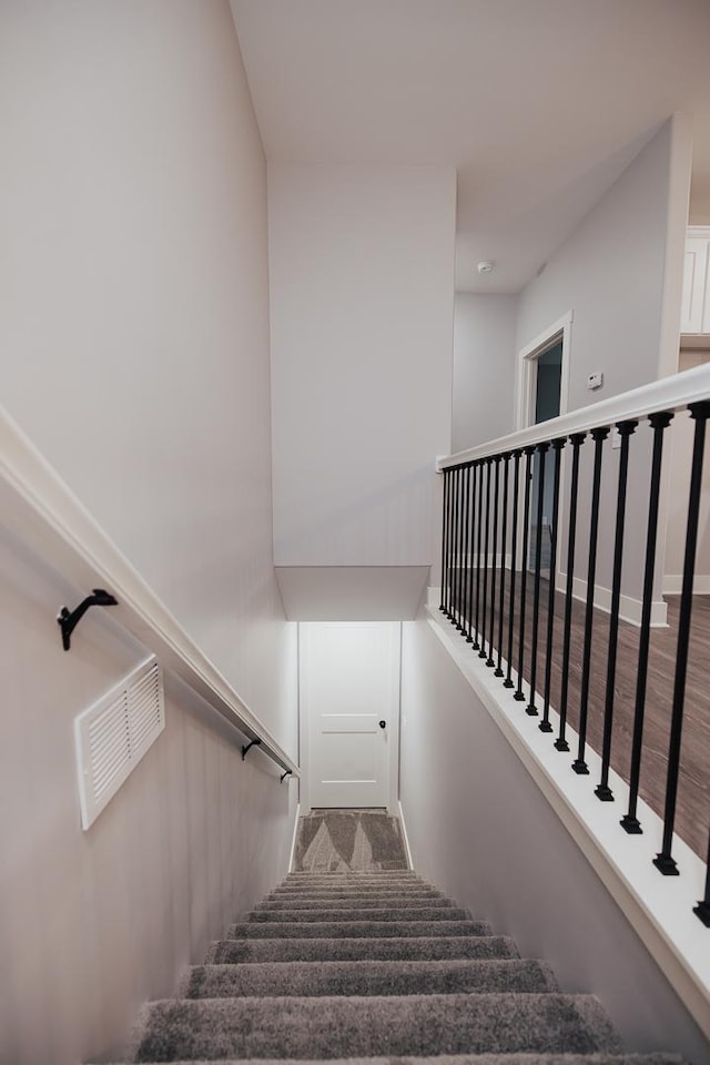 staircase with visible vents