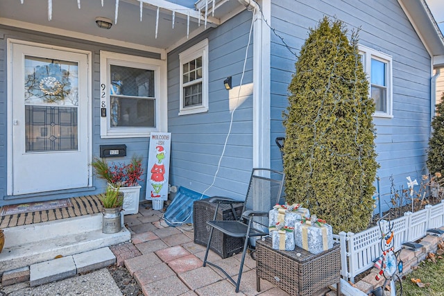 property entrance with fence