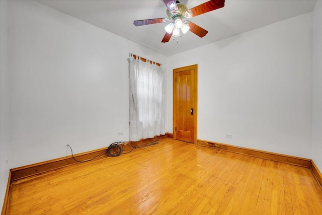 3016 N Major Ave, Chicago, IL 60634 - empty room featuring ceiling fan, wood-type flooring, and baseboards