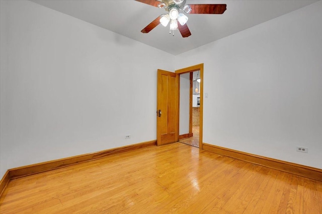 3016 N Major Ave, Chicago, IL 60634 - spare room featuring ceiling fan, light wood-style flooring, and baseboards