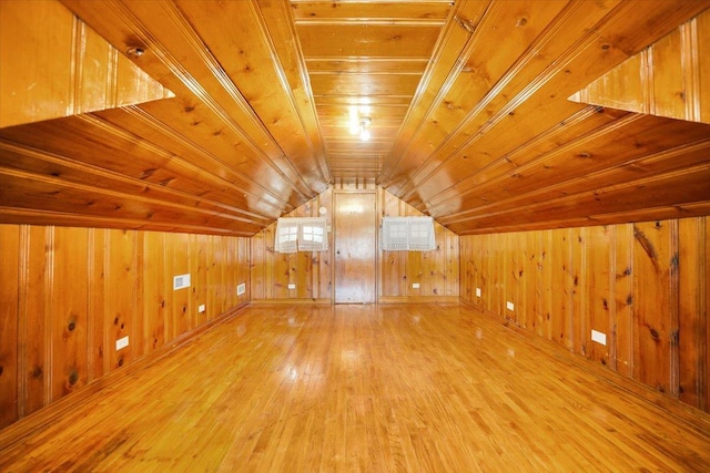 3016 N Major Ave, Chicago, IL 60634 - additional living space featuring vaulted ceiling, wood ceiling, wooden walls, and hardwood / wood-style floors