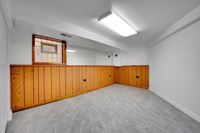 3016 N Major Ave, Chicago, IL 60634 - bonus room with a wainscoted wall, visible vents, wood walls, and baseboards