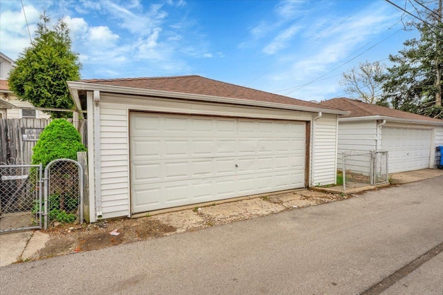 3016 N Major Ave, Chicago, IL 60634 - detached garage featuring a gate and fence