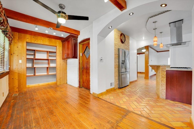 3016 N Major Ave, Chicago, IL 60634 - interior space with beam ceiling, baseboards, ceiling fan, and arched walkways
