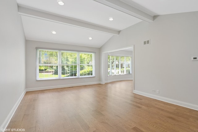 empty room with light wood-type flooring, baseboards, and recessed lighting