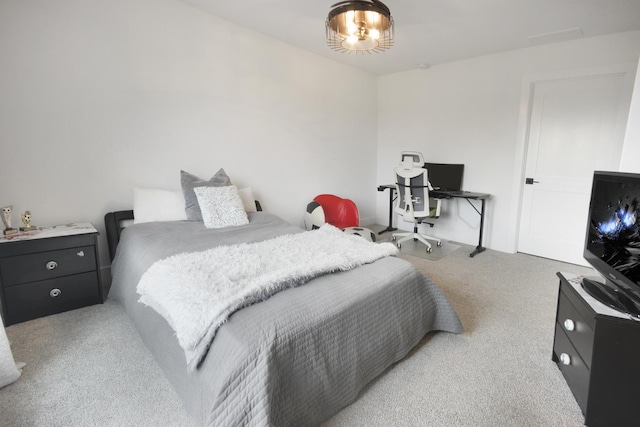 bedroom with light carpet