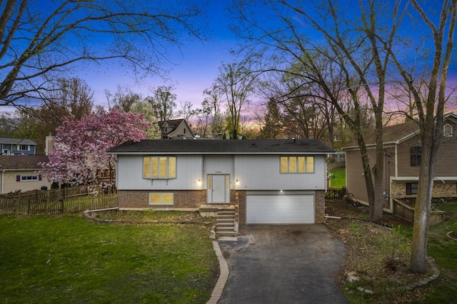 39540 N Channel View Dr, Antioch, IL 60002 - raised ranch featuring brick siding, asphalt driveway, and a garage