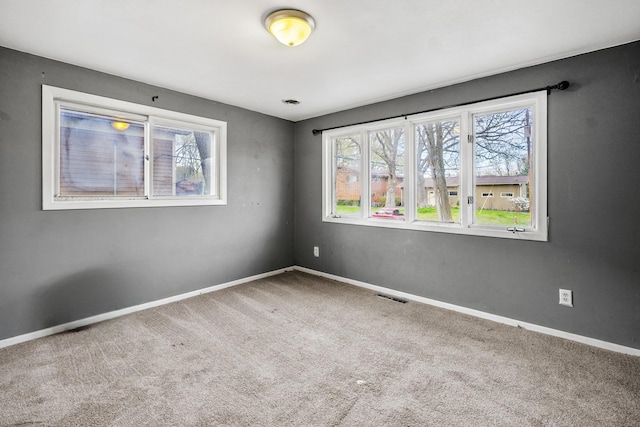 39540 N Channel View Dr, Antioch, IL 60002 - carpeted empty room with healthy amount of natural light and baseboards