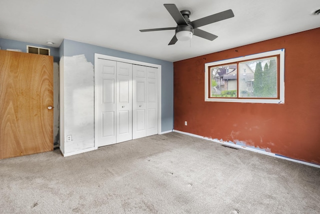 39540 N Channel View Dr, Antioch, IL 60002 - unfurnished bedroom with carpet flooring, a closet, baseboards, and a ceiling fan