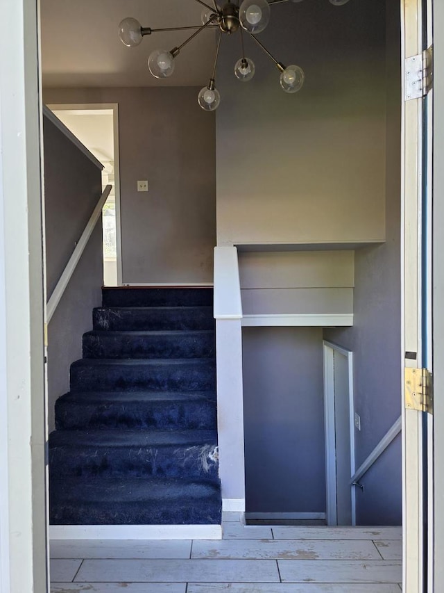 39540 N Channel View Dr, Antioch, IL 60002 - staircase featuring a chandelier and wood finished floors