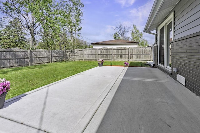 view of patio with a fenced backyard