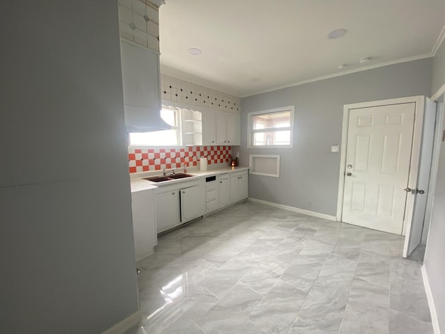 4826 S Throop St, Chicago, IL 60609 - kitchen with light countertops, ornamental molding, light marble finish flooring, white cabinets, and backsplash
