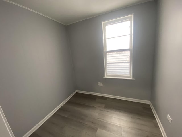 4826 S Throop St, Chicago, IL 60609 - unfurnished room with healthy amount of natural light, wood finished floors, baseboards, and ornamental molding