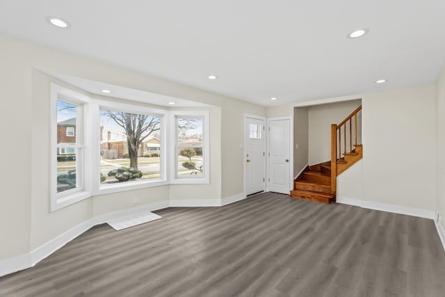 entrance foyer with baseboards, recessed lighting, and wood finished floors