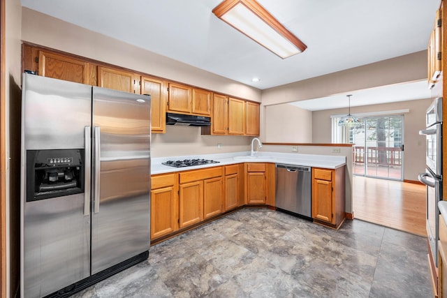 2218 Seaver Ln Unit 2218, Hoffman Estates, IL 60169 - kitchen with pendant lighting, a peninsula, light countertops, under cabinet range hood, and stainless steel appliances