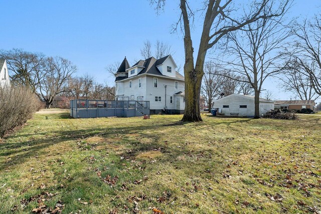 401 7th St, Mazon, IL 60444 - view of grassy yard featuring a deck