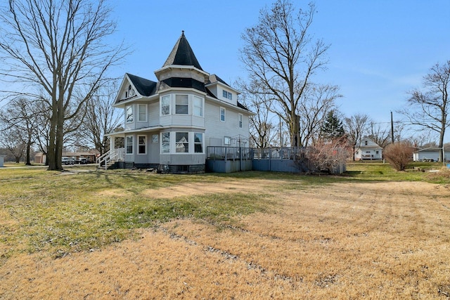 401 7th St, Mazon, IL 60444 - rear view of property with a yard
