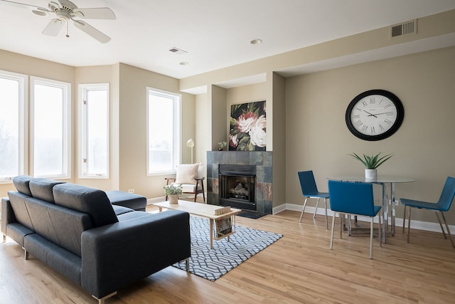 612 S Western Ave Unit 3, Chicago, IL 60612 - living area featuring baseboards, visible vents, ceiling fan, and light wood-type flooring