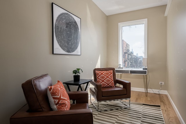 612 S Western Ave Unit 3, Chicago, IL 60612 - sitting room with baseboards and wood finished floors