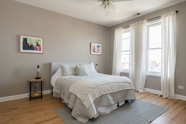 612 S Western Ave Unit 3, Chicago, IL 60612 - bedroom with multiple windows, light wood-type flooring, and visible vents