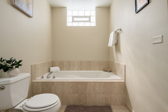 612 S Western Ave Unit 3, Chicago, IL 60612 - full bathroom with toilet, tile patterned flooring, and a garden tub