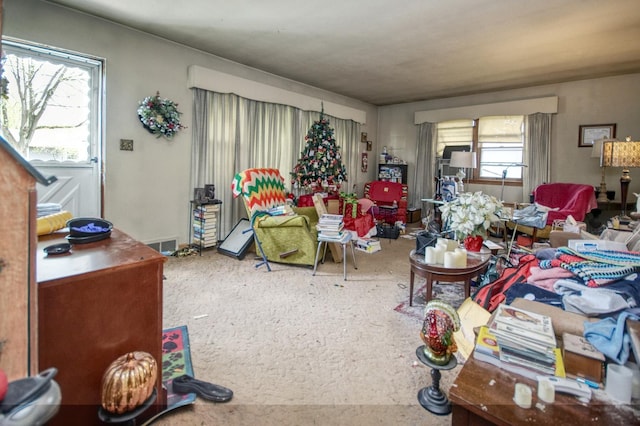 living room featuring visible vents