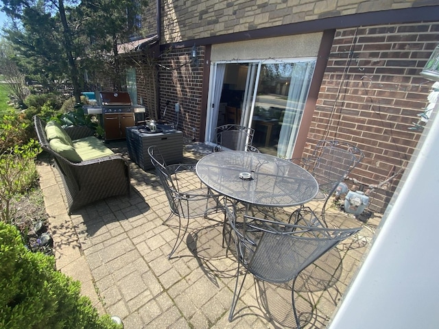 view of patio with outdoor dining space