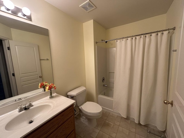bathroom featuring toilet, visible vents, shower / tub combo with curtain, and vanity