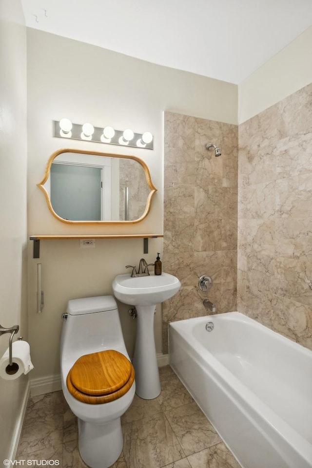 3755 N Wilton Ave Unit 3Se, Chicago, IL 60613 - full bath featuring shower / bath combination, marble finish floor, baseboards, and toilet
