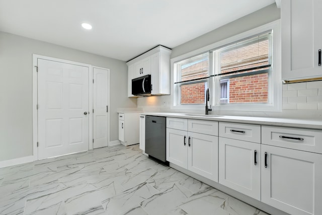 kitchen featuring white cabinets, a sink, dishwasher, light countertops, and recessed lighting