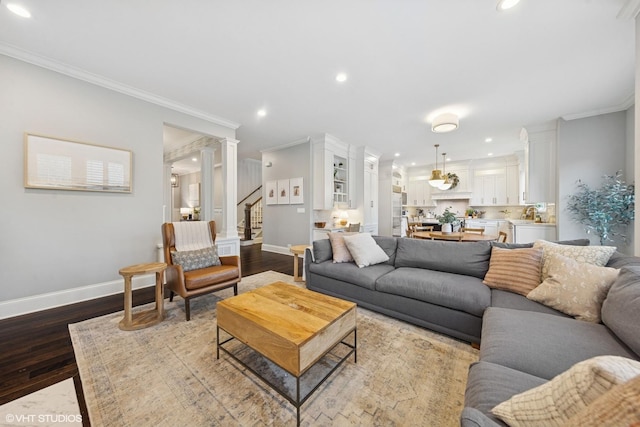 311 E Schiller St, Elmhurst, IL 60126 - living area with baseboards, dark wood-style floors, recessed lighting, crown molding, and stairs