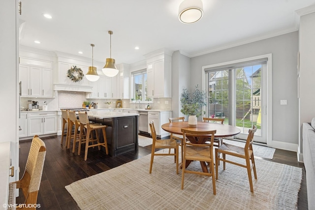 311 E Schiller St, Elmhurst, IL 60126 - dining area with healthy amount of natural light, crown molding, dark wood-style floors, recessed lighting, and baseboards
