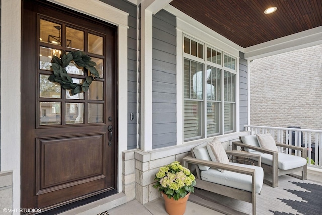311 E Schiller St, Elmhurst, IL 60126 - doorway to property featuring a porch and brick siding