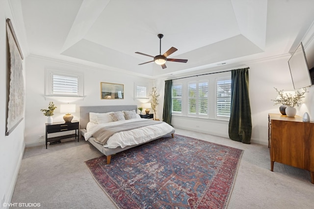 311 E Schiller St, Elmhurst, IL 60126 - carpeted bedroom featuring a raised ceiling, baseboards, and ceiling fan