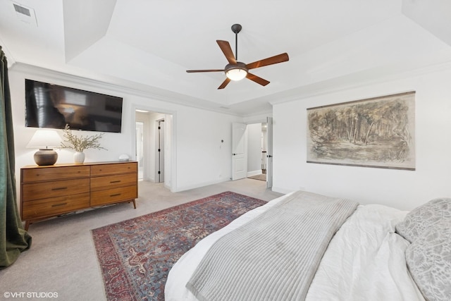 311 E Schiller St, Elmhurst, IL 60126 - bedroom with light colored carpet, a tray ceiling, and a ceiling fan