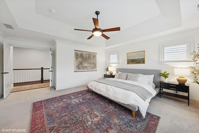 311 E Schiller St, Elmhurst, IL 60126 - bedroom featuring a raised ceiling, carpet floors, a ceiling fan, baseboards, and crown molding