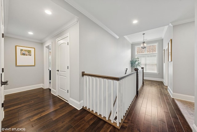 311 E Schiller St, Elmhurst, IL 60126 - hallway featuring an upstairs landing, dark wood-style floors, baseboards, a chandelier, and ornamental molding